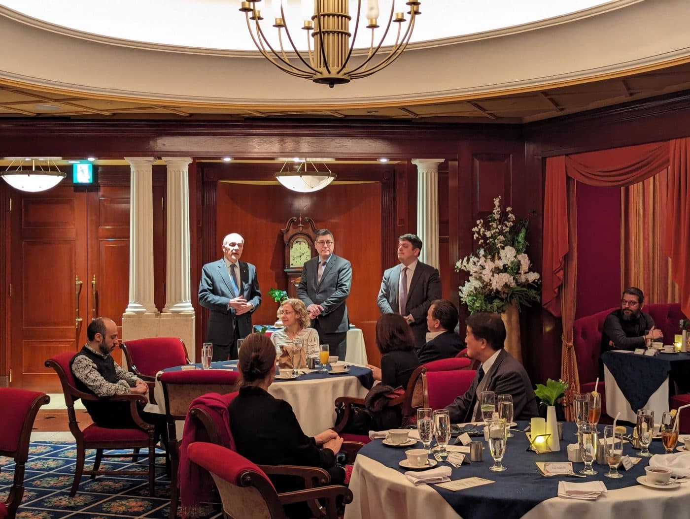 GrCCJ President Tony Andriotis and board leadership addressing members at a chamber dinner in Tokyo